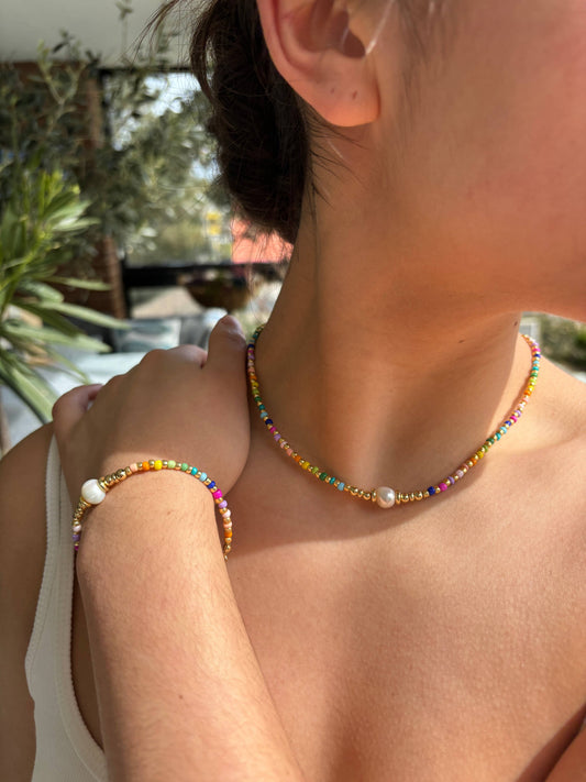 Pearl rainbow necklace in 18ct gold plated brass with freshwater pearls and colourful accents for a layered jewellery look