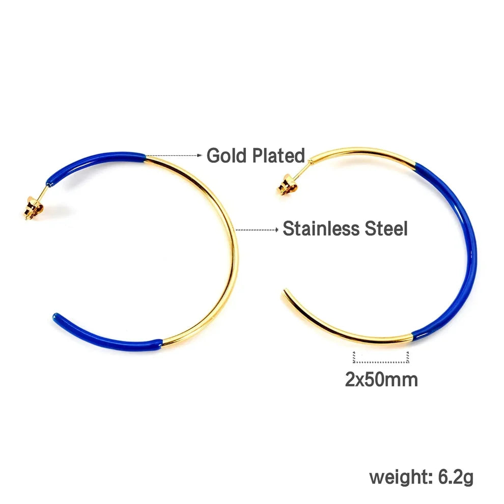 Gold-plated and stainless steel hoop earrings with blue accents, shown on a white background with text labels indicating dimensions and weight.