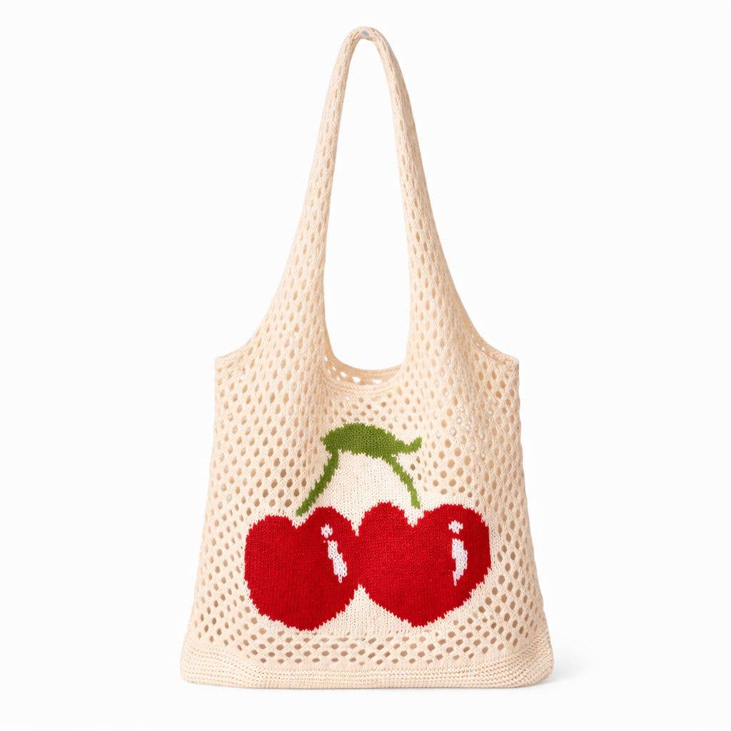 Beige woven bag with red cherries on a white background