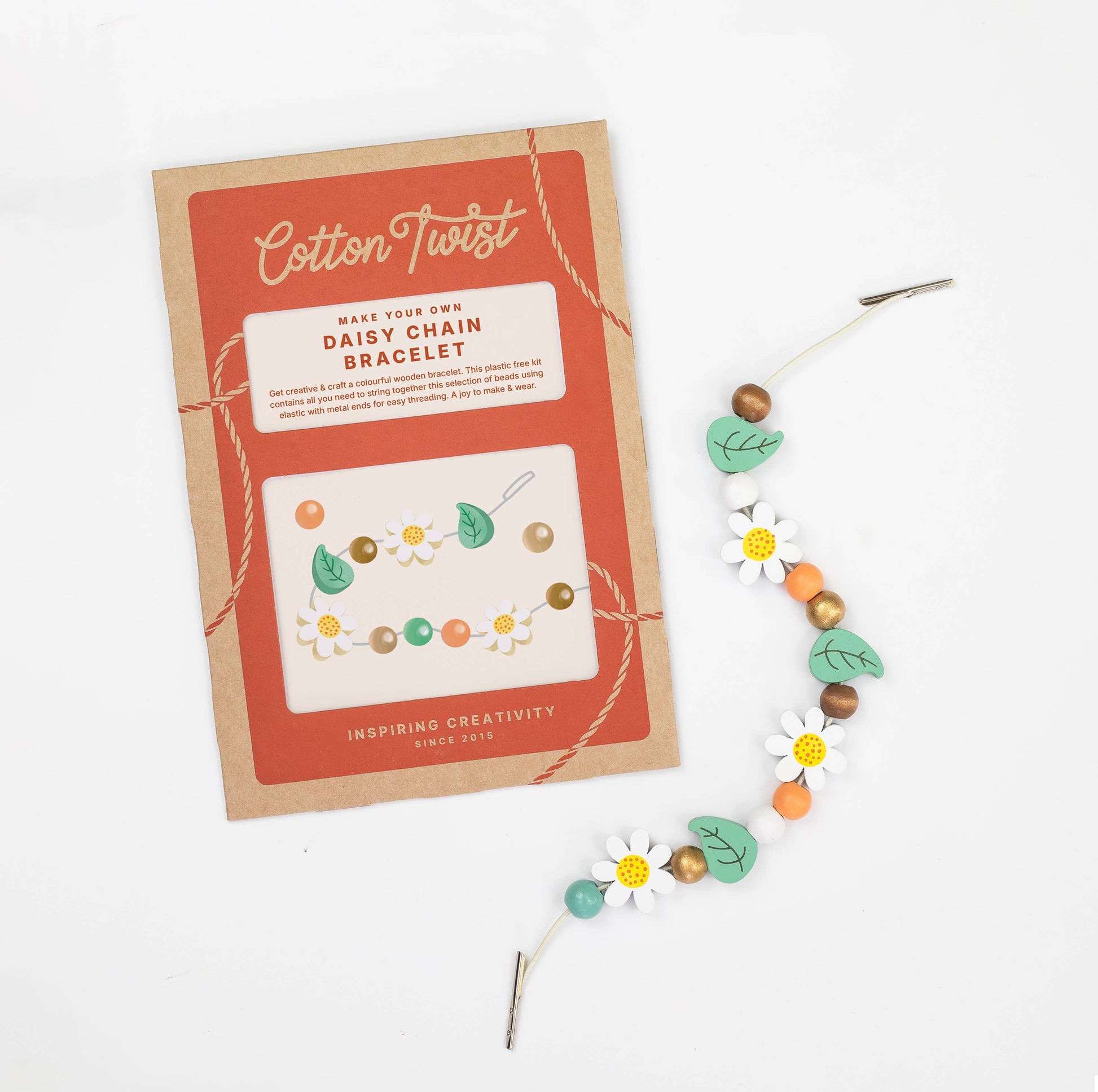 Cotton Twist daisy chain bracelet kit with a completed bracelet on a white background
