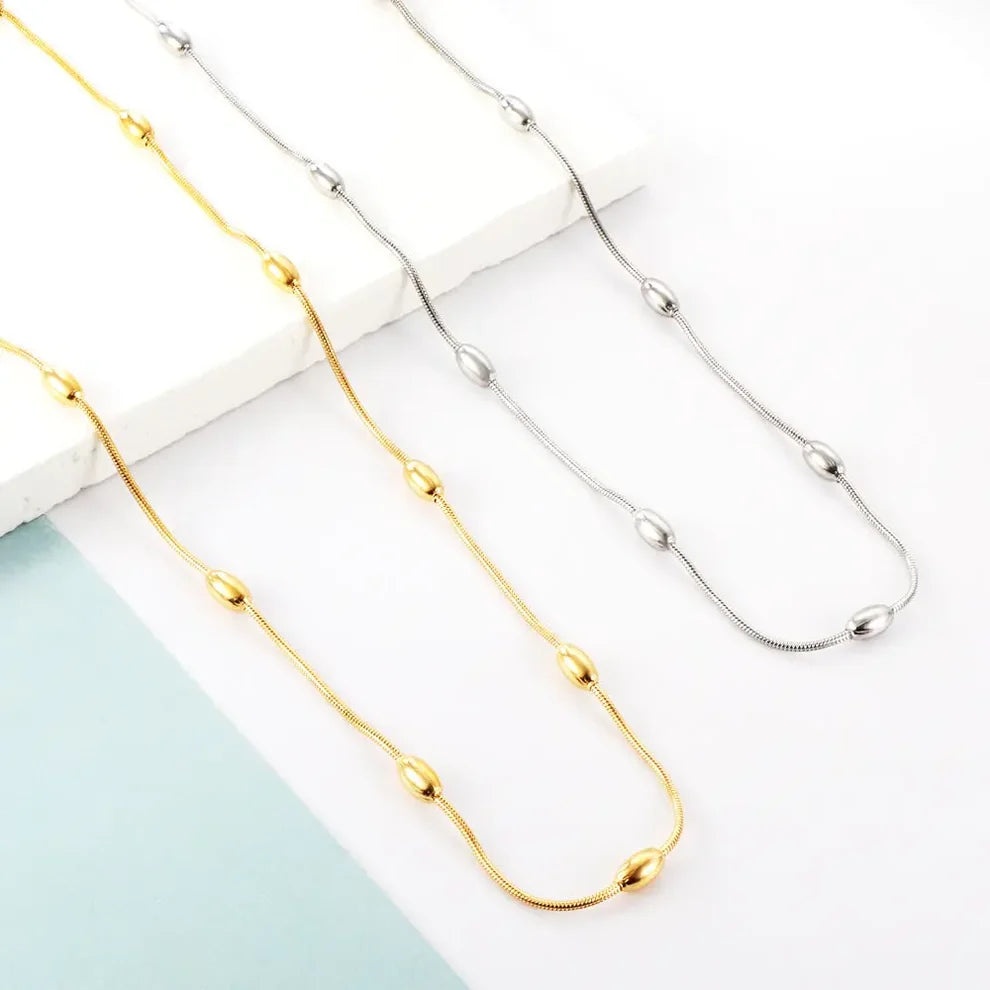 Delicate Gold Oval Bead Necklace