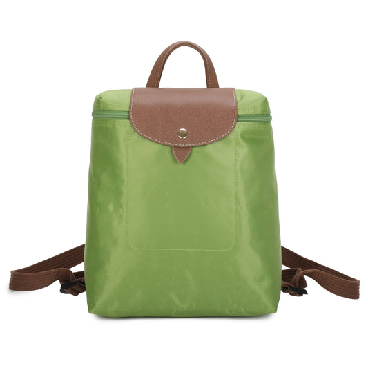 A green nylon backpack with brown faux-leather trim, a top handle, and adjustable shoulder straps, shown against a plain white background.