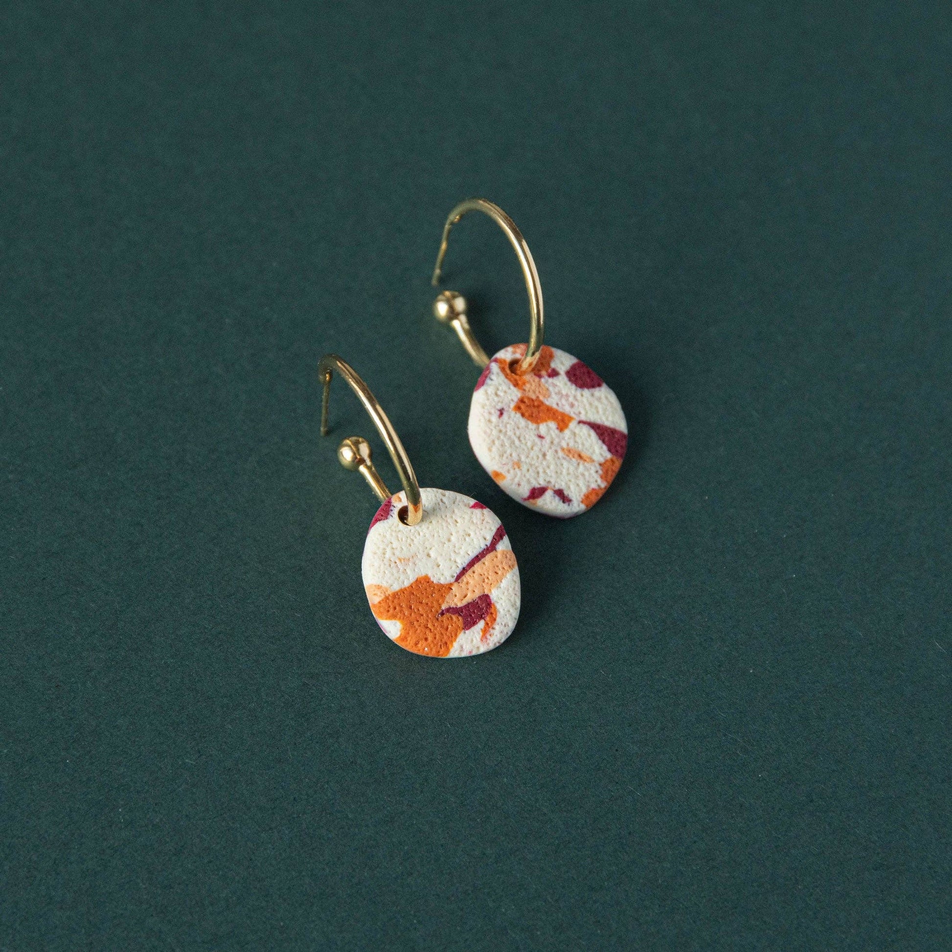 Handmade terrazzo hoop earrings in teal, lilac and chartreuse polymer clay with gold plated hoops