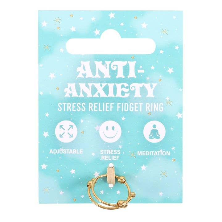 Anti-anxiety stress relief fidget ring on a blue card with star patterns