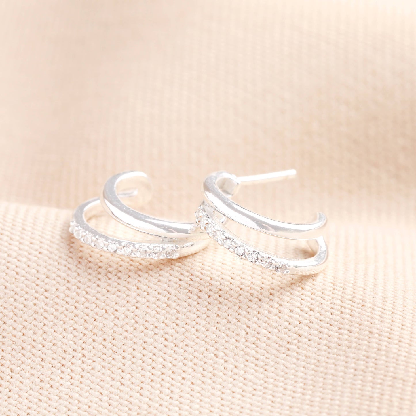 Sterling silver crystal illusion huggie hoop earrings with cubic zirconia, minimalist and hypoallergenic design