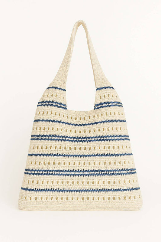 Striped tote bag with blue and beige pattern on a white background